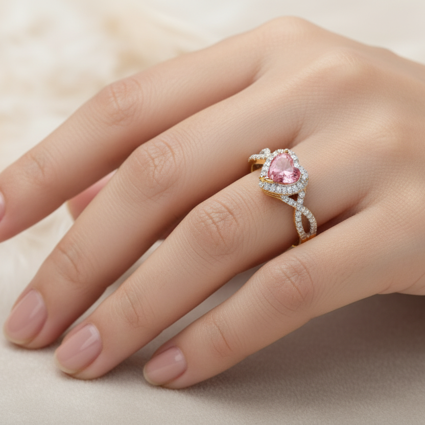 14ct yellow gold heart ashes ring with crossover shoulders on green velvet