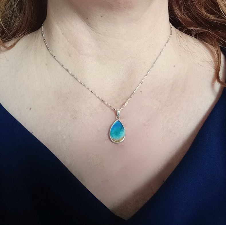 beach ashes necklace on model