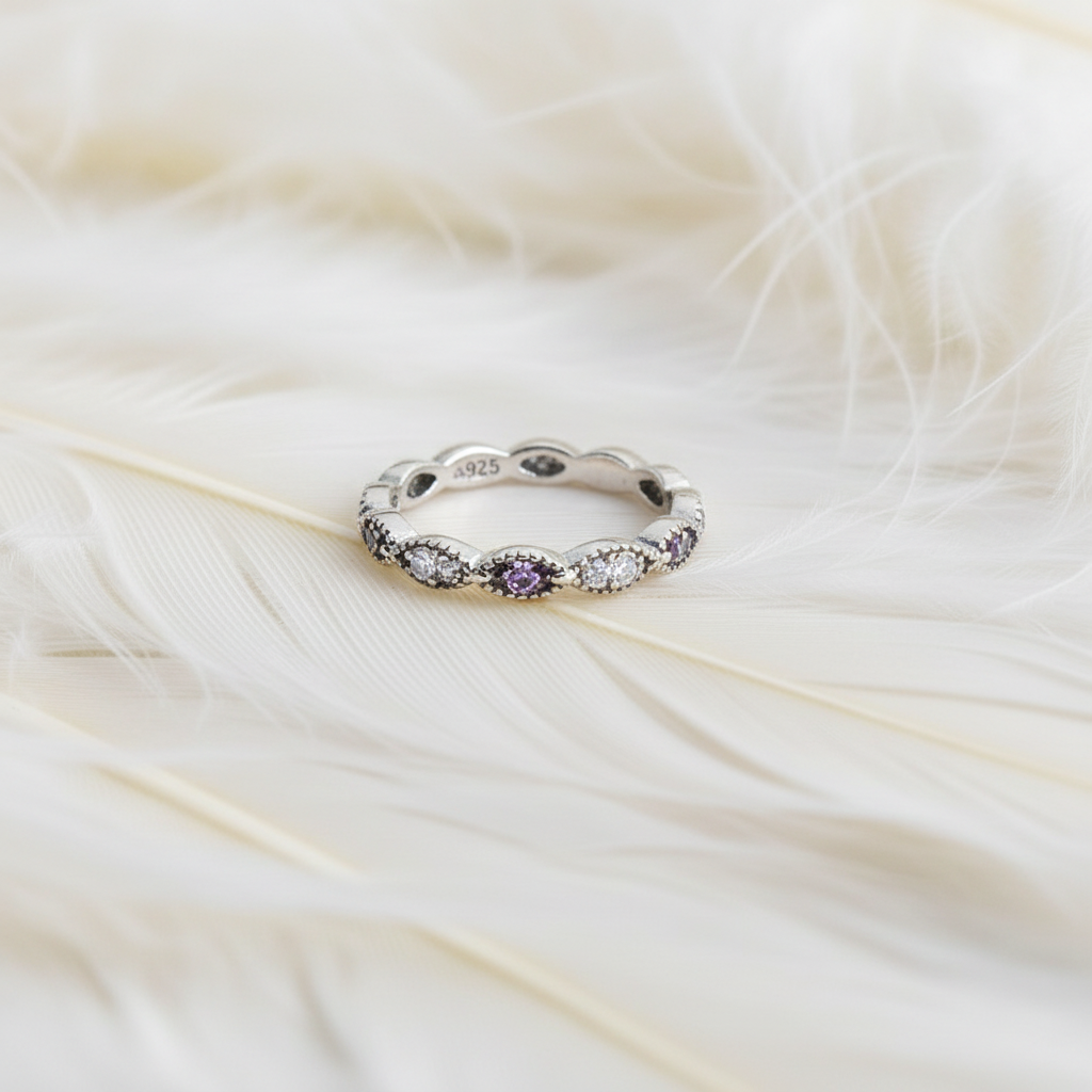 white gold ashes memorial ring featuring birthstones in an eternity band