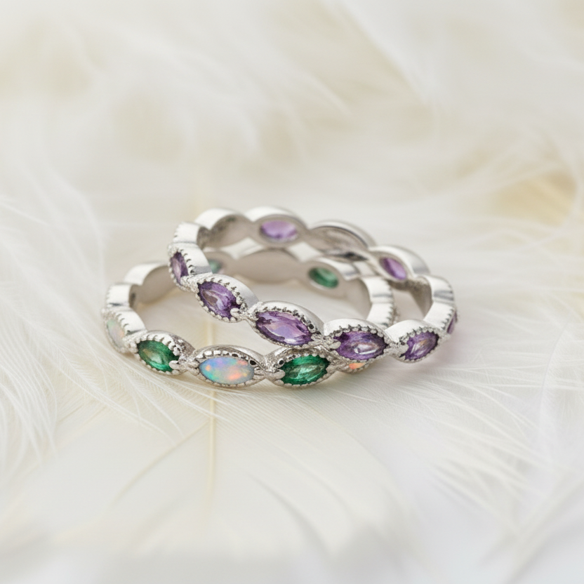 two eternity rings with ashes cremation memorial on green velvet