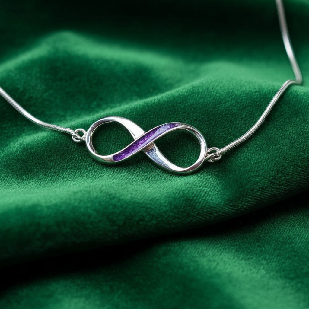 infinity ashes memorial bracelet on green velvet background