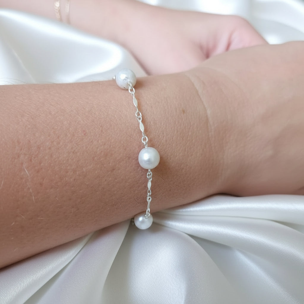 ashes pearl bracelet on model arm