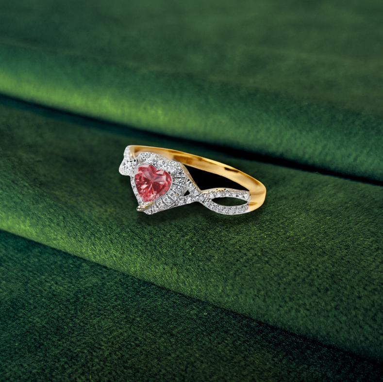 14ct yellow gold heart ashes ring with crossover shoulders on green velvet