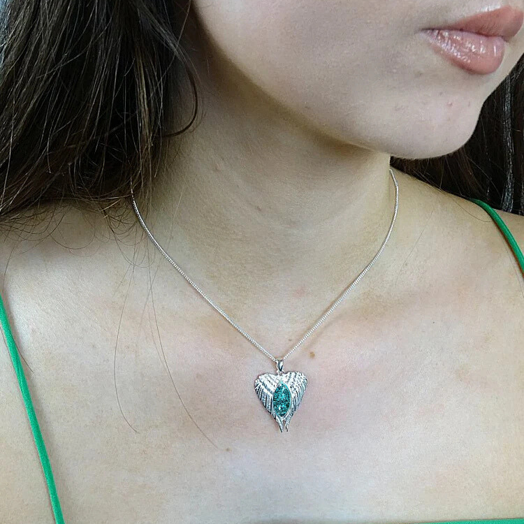 angel wings ashes necklace on model