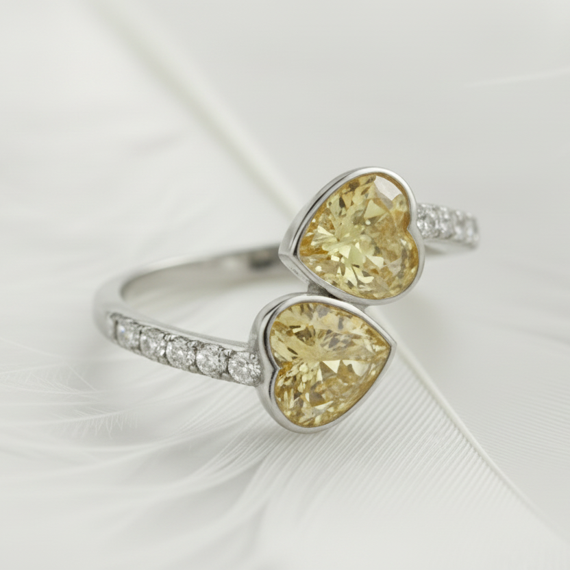 double heart ashes memorial rings in silver with a golden ashes stone