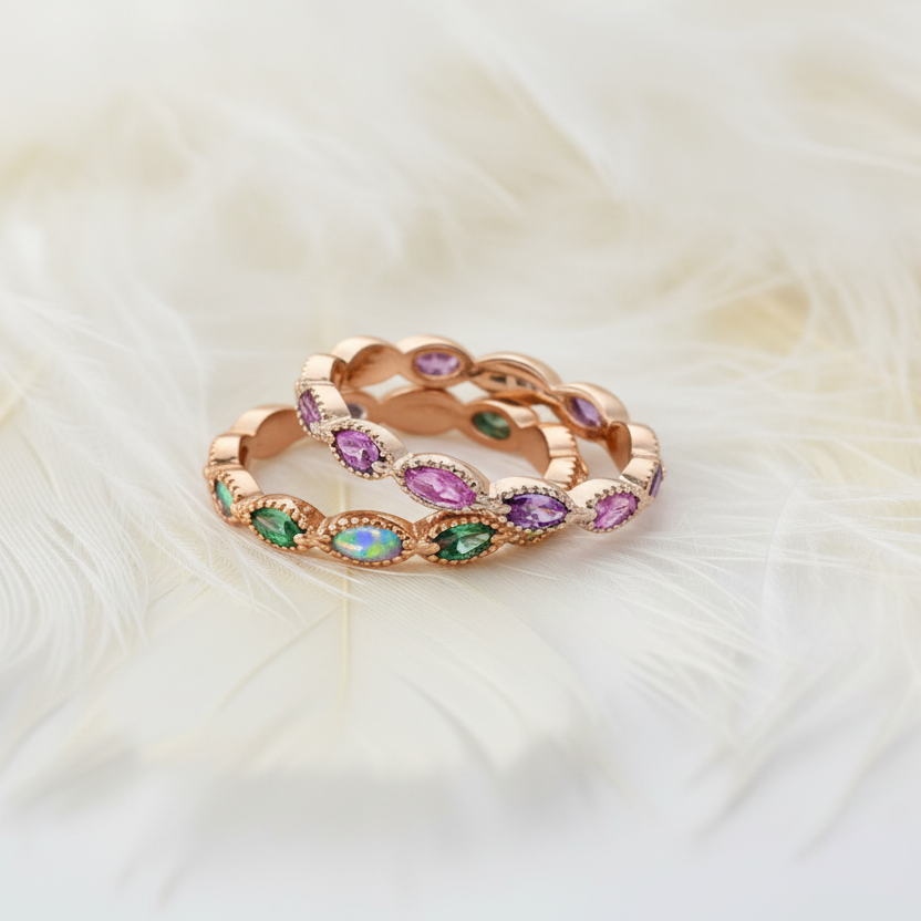 two eternity rings with ashes cremation memorial on green velvet