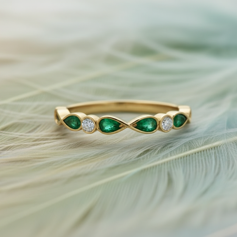 14ct yellow gold infinity ashes ring set with genuine diamonds and emerald ashes stones