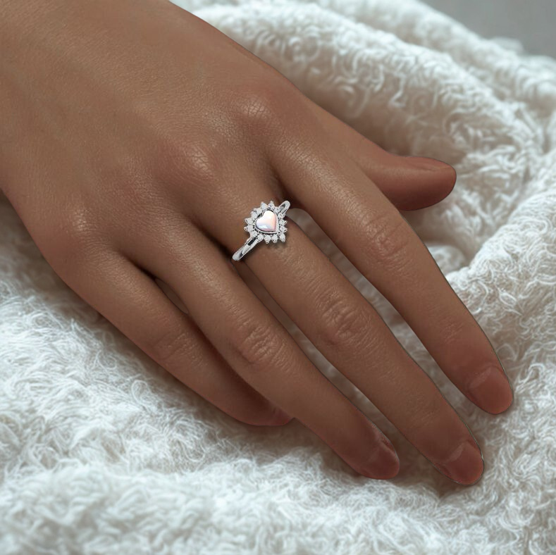 heart cluster ashes memorial ring on model with white blanket