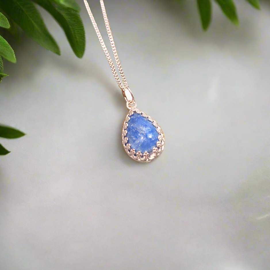 teardrop filigree ashes necklace on white background