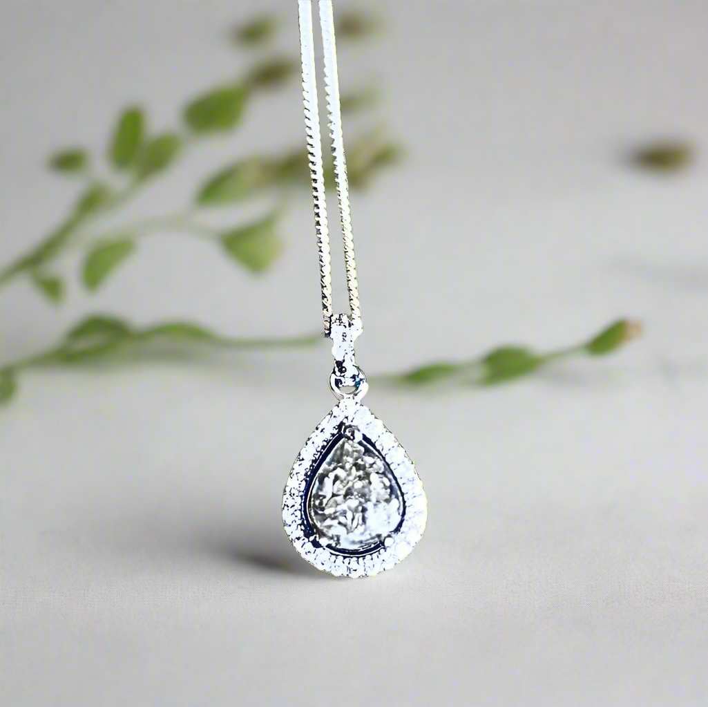 teardrop halo ashes necklace on white background